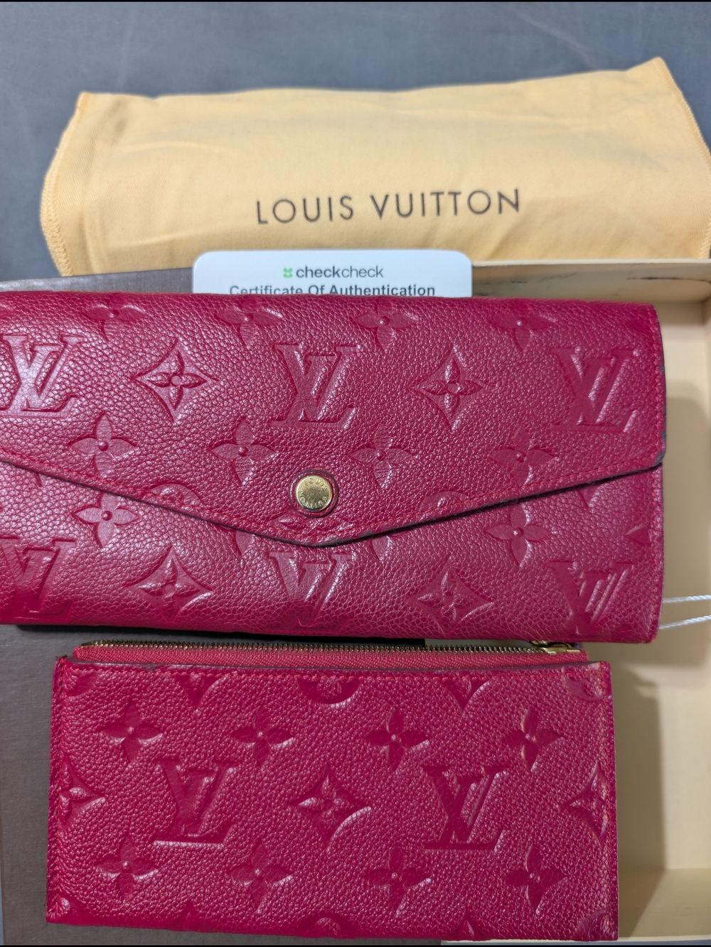 Louis Vuitton Monogram Empreinte Curieuse Long Wallet with Removable Zip Pouch.